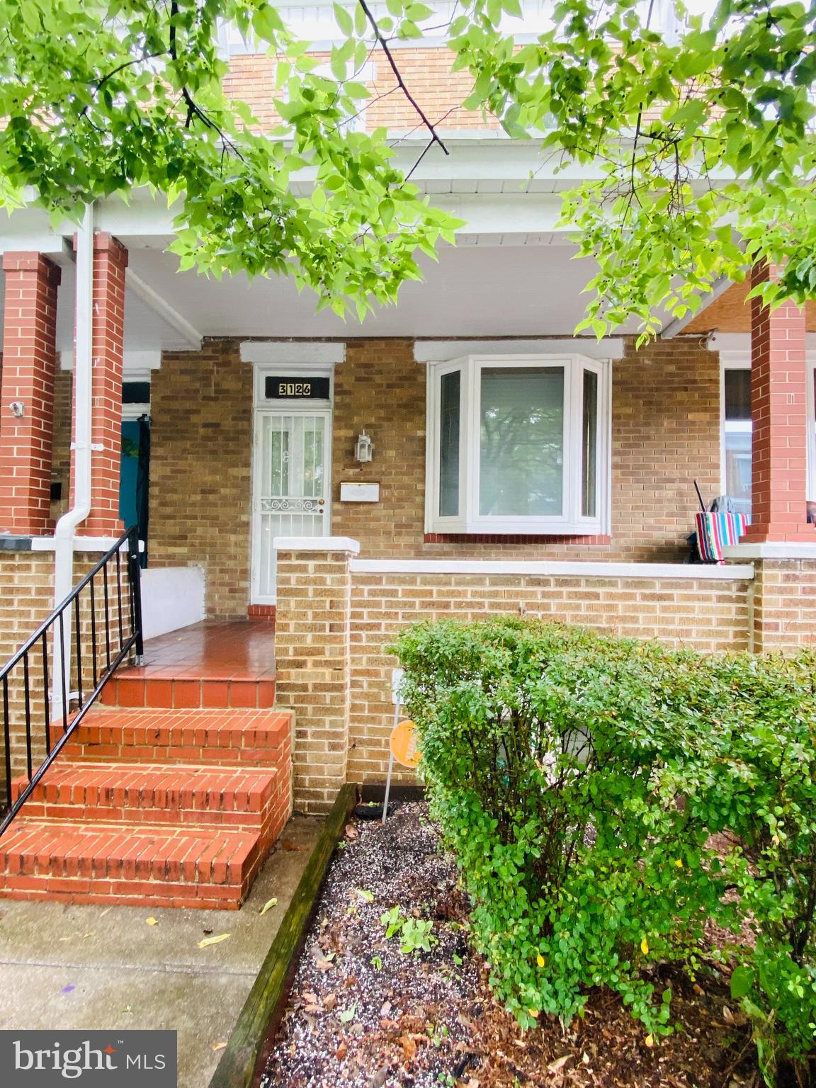 This well-maintained porch front home is a great opportunity at this price. As you enter, you will be greeted by a large living room, formal dining room, and galley-style kitchen, followed by a rear patio and detached garage. The lower level is partially finished with lots of storage. The upper level offers 2 spacious bedrooms and one full bath. This home is being sold 100% 'AS-IS', and no repairs or repair credits can be offered. Any leftover items in the home or garage will not be removed from the property.