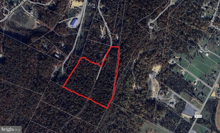 18+/-  acre wooded lot.   The property offers privacy, seclusion,  and wildlife.  Raw land.  Property is on both sides of Barrett Lane.