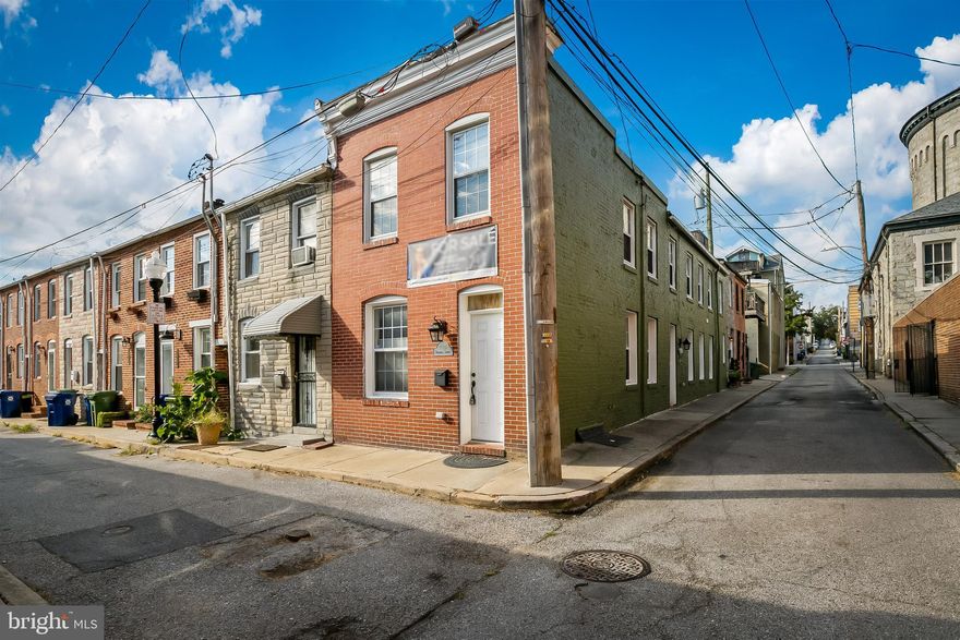 Maryland's local brokerage proudly presents this move-in ready beautiful 3 bed/3 bath, 14 FOOT WIDE end unit in Fells Point! The main level boasts a nice spacious living room, dining room, kitchen, a full bath, and bedroom.  The kitchen offers granite countertops, table space, and stainless steel appliances. The washer dryer can also be found on this level. There are hardwoods throughout, nice high ceilings, and tons of natural light. The upstairs level offers two updated full baths and two extra large bedrooms. Tons of storage in the basement. NEW water heater (2022). NEW A/C condenser (2020). You'll love this secluded quiet street, right in the heart of the Fells Point AND Canton action!  You won't want to miss your chance to call this one home!