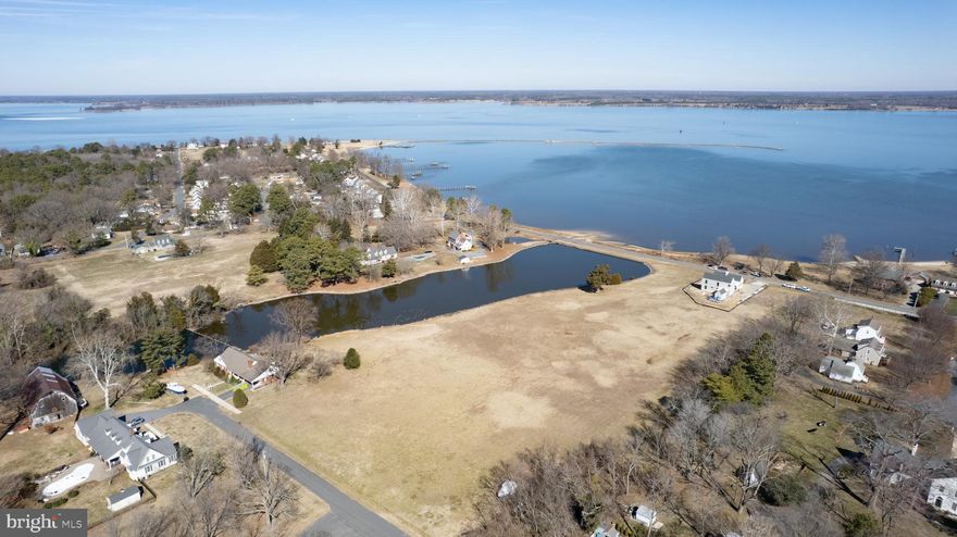 One of the BEST locations in Dorchester County - just shy of 4 acres this beautiful property overlooks Pink's Pond, Hambrook's Bay and the Choptank River.  Property has been subdivided for decades and should have water & sewer allocations (buyer to confirm).  Opportunity to own this property and create a family compound, small subdivision or create your own private homesite located just outside of the City Limits of Cambridge.   A short walk to Great Marsh Park with public boat ramp, YMCA with indoor pool, racquetball, and weight lifting equipment, Glasgow Courts for public tennis & pickleball and so much more.