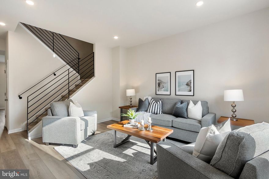 Welcome to one of the original homes in Grays Estates, a rare community of 19 NEW CONSTRUCTION, affordable housing townhomes with tax abatements! This home is beautifully laid out with a center staircase and a large open kitchen with sliding glass door to back yard. The home also features 10 foot ceilings on both floors, three bedrooms, and one and a half bathrooms. The laundry room and utility room are on the main floor and easily accessible. Purchasers must meet the PHDC guidelines of earning less than 120% of the area median income to qualify. Approximately 8 years are remaining on the full tax abatement (100% of the improvement value is abated). Schedule your showing today!