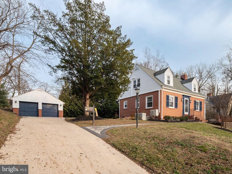 Nestled in the charming Catonsville neighborhood, this delightful Cape Cod home exudes warmth and character. Built in 1951, it has been updated for modern living  while maintaining its charm.  The home is in excellent condition, ready to welcome you.  Sunlight pours into the home  through the large windows on both the main and upper levels. You will love the beautiful refinished hardwood floors throughout the house.  The inviting living room boasts a fireplace, perfect for gathering with loved ones on chilly evenings. The home offers three spacious bedrooms, providing ample room for relaxation and personalization. The heart of the home is the well-appointed and recently remodeled (2023) kitchen, equipped with modern appliances including a built-in microwave, dishwasher, and refrigerator with an ice-maker. Cooking and entertaining will be a joy here, with sleek counter space and storage for all your culinary needs. Venture downstairs to the fully finished basement, a versatile space that can serve as a workshop, play area, or additional living space. With both interior and outside entrances, it offers convenience and flexibility. Outside, the property features extensive hardscape and exterior lighting, creating an inviting atmosphere for outdoor gatherings. The detached garage and driveway provide ample parking for you and your guests. Set on a generous 0.22-acre lot, this home offers a perfect blend of comfort and functionality, making it an ideal choice for those seeking a place to call home. Don't miss the opportunity to make this charming residence your own!