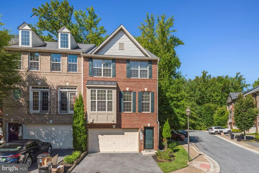 BUYER LOST HIS JOB,  LOCATION LOCATION LOCATION EXCLUSIVE COMMUNITY WON'T LAST LONG..........  Access to ICC and CLOSE  to Metro, Nearby shopping, restaurants and more. Top of the line finishes end unit  ... hardwoods, granite countertops, stainless steel appliances and FP in the great room area. 3 levels, 4 beds w/walkout basement, 2-car garage, full size washer and dryer on the top floor with Brazilian cherry flooring throughout home, deck off of the kitchen, a quiet cul-de-sac and surrounded by nature, amazing exclusive community.