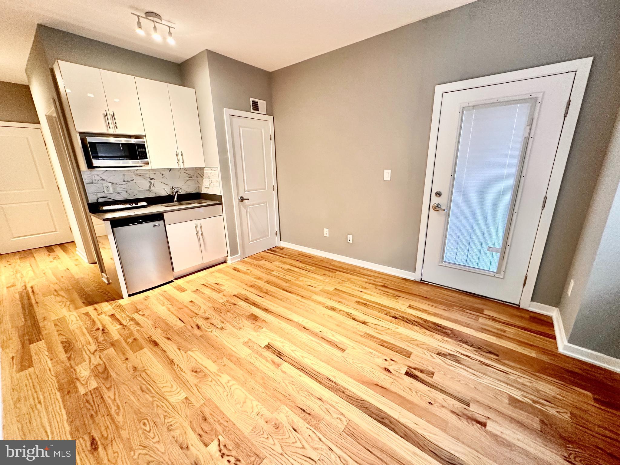 University City studio apartment available for immediate occupancy. Located one block from Drexel's Vidas Athletic Complex and convenient to UPenn and Drexel University Main Campuses. The third floor unit has hardwood floors throughout and central air conditioning. The kitchenette features contemporary cabinets, garbage disposal, microwave, hotel refrigerator and a stowable electric two burner stove. A flat fee of $125 per tenant covers wifi, laundry, all utilities and garbage. Additionally there is a modern bath with tiled tub shower. Each tenant is assigned a personal entry code for the main entrance which can be shared with delivery services for secure package delivery. Pets are also considered with additional pet rent and/or deposits. Undergraduate students welcome with cosigners. Reach out for the video tour, showings and applications.