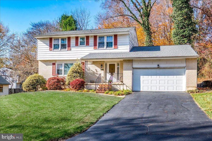 Prime North Wilmington location in the popular community of Brandywood backing to designated county land, this two-story colonial features many new replacement windows, newly renovated primary bathroom, beautifully maintained hardwood floors plus updated hall bath & kitchen. On the main level you’ll find the generously sized living room, formal dining room and kitchen offering warm wood-tone cabinetry and ample countertop prep space. The adjacent family room boasts a wood burning stone fireplace and sliding glass doors leading to the rear flagstone patio overlooking the wooded rear yard that backs to open county land. Perennial flowers fill the rear yard and side path. A convenient guest powder room & interior access to the two-car garage completes this level. Upstairs, the primary suite offers a newly renovated private bath and a fabulous walk-in closet. Three additional well-sized bedrooms share an updated full hall bath. Plenty of storage found in the hall linen closet and walk-in hall attic. The unfinished basement offers excellent space for even more storage, a workshop, or the opportunity to finish for additional living area. Recent updates include many new windows (PJ Fitzpatrick, 2025), gas furnace (Calvert, 2023) and single-layer roof (2018). A desirable school feeder patters & Convenient North Wilmington location - just minutes from great shopping and dining, walking distance to Jasper Park plus easy access to major routes for quick commutes around Wilmington or into nearby Pennsylvania.