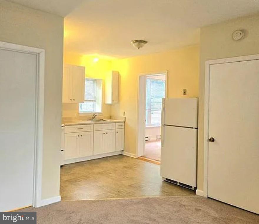 This charming 1-bedroom, 1-bath apartment offers convenient first-floor, walk-in access with the comfort of off-street parking. The generous-sized bedroom provides plenty of space to relax, while the open-concept living and kitchen area makes entertaining or everyday living a breeze. With its practical layout and easy accessibility, this home is ideal for anyone seeking both comfort and convenience. Rent includes sewer, water, trash. Tenant pays electricity and wifi/cable. Small pet friendly on a case by case basis.