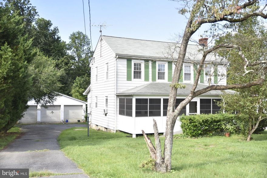 Unique opportunity live in "The Village". Located right on Old Village Road in Mechanicsville, this home brings you back to slower days in St. Mary's County. Over 2500 square feet with real hardwood floors. Large living room features brick fireplace. Relax on your spacious front porch. Extra large detached five car garage. New roof was installed in 2018. 12KW generator for house.  Walk to restaurants, convenience store, or bank.  Three Notch Trail is just one minute away. Property being sold AS IS. Schedule your appointment today!  Seller is offering $1000 bonus to Buyers Agent!!
