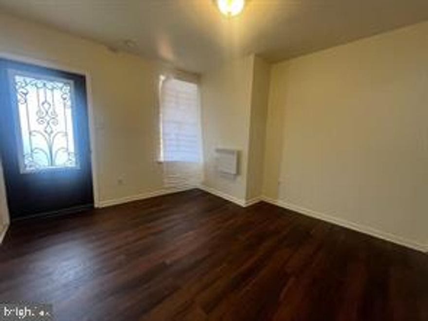 START COLLECTING RENT IMMDEIATELY!! The 2nd floor unit is rented until 02/27/26 for $1,100.00/month. Here is a great opportunity to live in one unit and rent out the other!This property features two, 2-bedroom units and which have been modestly renovated. Each unit has separate utilities with electric heaters, and electrical panels. The first floor unit has access to the rear yard, and there is extra storage in the basement. The kitchen is open to the living room allowing you to easily entertain. Unit 2 offers a comfortable living room, large kitchen and two nicely sized bedrooms. Some of the original features have been kept for that nostalgic feel. Come and take advantage of having your tenant pay the majority of your living expenses. **Ask us about the Home Opportunity Loan with 100% Financing Option and the UL Grant.**