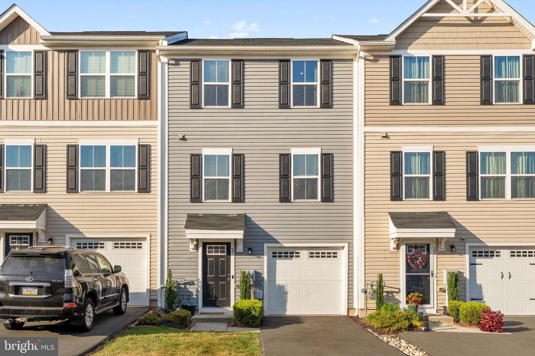 Modern Townhome in Boyertown Area School District with 1-Car Garage! Welcome to this stylish 2021-built townhome in the desirable Foxwood Ridge neighborhood. Offering a 1-car attached garage, contemporary finishes, and a low-maintenance lifestyle, this home is a fantastic opportunity. The entry level features durable LVP flooring, convenient garage access, and a versatile bonus room—perfect as a home office, gym, den or playroom —with direct access to the backyard. Upstairs, the open-concept main level is the heart of the home. The kitchen offers recessed lighting, stainless steel appliances, a deep sink, and modern cabinetry. The dining area, complete with sliding doors ready for a future deck, flows seamlessly into the bright and spacious living room. A convenient powder room completes this level. The upper level boasts a relaxing primary suite with a generous walk-in closet, and a private en suite bathroom with a tub/shower combo. Two additional well-sized bedrooms, a full hall bath, and a laundry room complete the top floor. Built in 2021, this home offers the confidence of newer systems and roof, providing peace of mind for years to come. The low HOA fee includes trash, lawn care and common area maintenance, giving you more time to enjoy life. Conveniently located near Upland Square Shopping Center, Philadelphia Premium Outlets, and local favorites like Doc’s Irish Pub, with easy access to Route 100 for commuting. Schedule your showing today and see all this home has to offer!