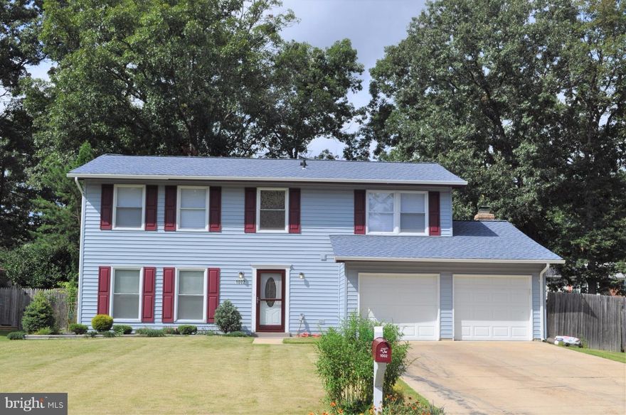 Beautiful 5 bedroom, 2 1/2 bath Colonial in Waldorf. This house has a great kitchen with granite counter-tops, kitchen island with cook-top, freshly painted throughout, marble and hardwood flooring, wood-burning fireplace in family room, updated roof and siding, huge patio leading into the large fenced backyard, warranty and so much more. Plenty of parking here, too! Easy commute to Washington DC