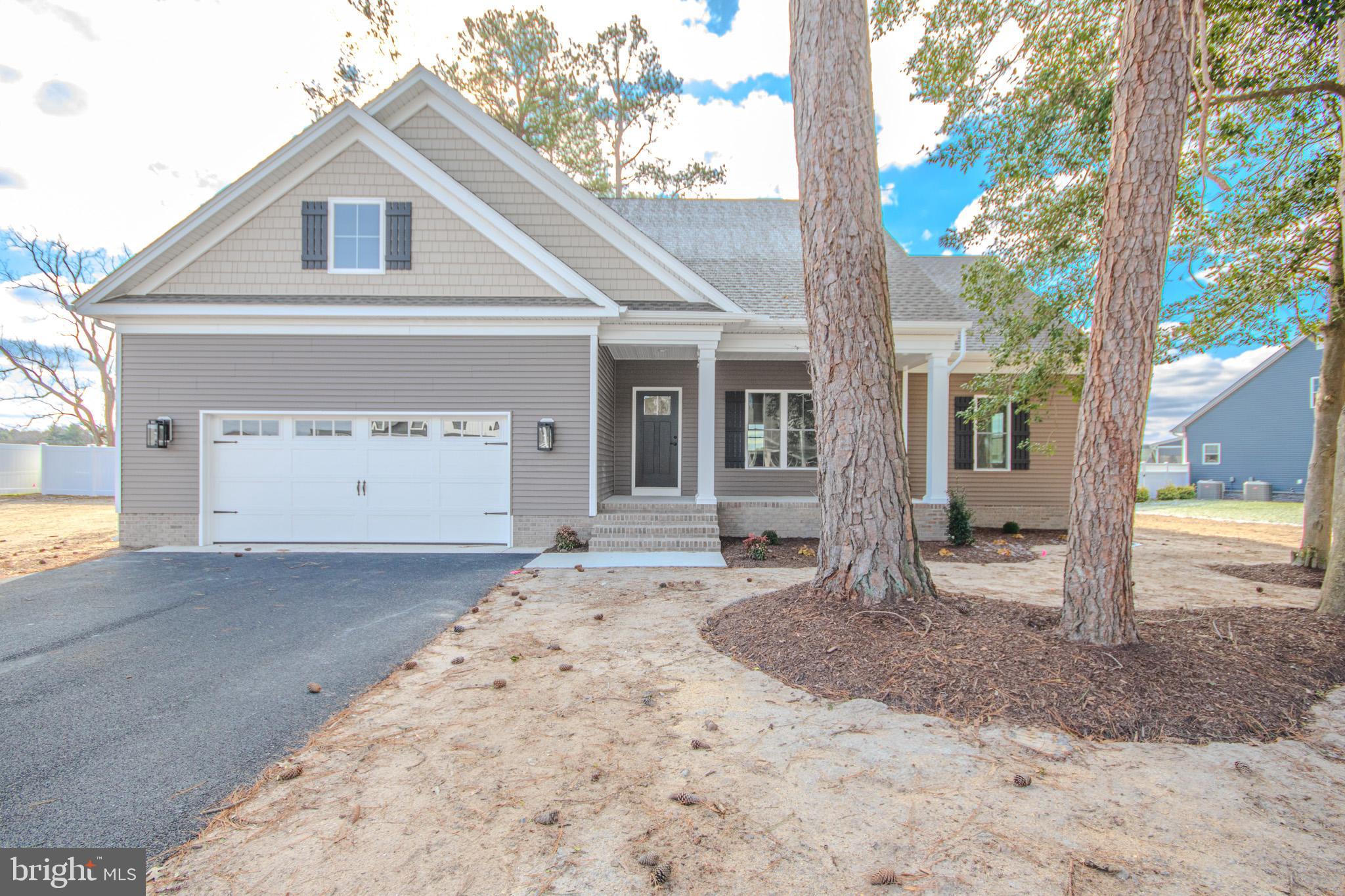 An inviting covered front porch welcomes you home into a spacious open floor plan with a dramatic vaulted ceiling, recessed lighting and a feature fireplace in the family room. The stunning kitchen with a large island with bar seating as well as a separate eating area will delight the cooks in the family. There is a beautiful primary bedroom and bath with a large walk-in closet on the main floor and a spacious laundry room. The second floor boasts 2 additional bedrooms, a nice sized bath, a large bonus room and a loft area. There's a large, fenced back yard and in-ground irrigation system. This property is a great value for a beautiful home with significant upgrades. Don't let it get away!