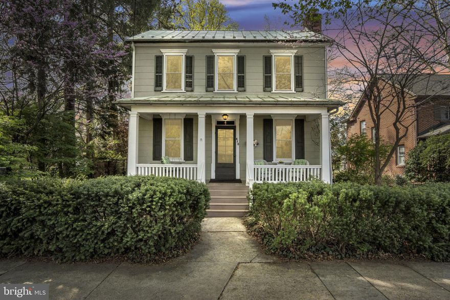 Nestled in the sought-after Old Mooreland neighborhood, this lovingly maintained property is filled with charm, warmth, and timeless character—it truly feels like home the moment you step inside. Ideally located in one of Carlisle’s most desirable areas, you’ll enjoy easy walkability to downtown, the college, and access to Mooreland Park.

Imagine relaxing on the spacious front porch, overlooking a picturesque tree-lined street on a quiet evening. Inside, you’re welcomed by a generous living room featuring beautiful hardwood floors, a cozy wood burning fireplace, and elegant built-ins. The living space flows seamlessly into an open kitchen and dining area—perfect for everyday living and entertaining.

Just off the dining room, a large bright family room with a gas stove offers additional space to gather and unwind.  The main level also includes a versatile bedroom or home office with an attached full bath. Upstairs, you’ll find three additional bedrooms and another full bath, each room offering their own unique charm and comfortable space.

Step outside from the family room into a beautifully landscaped backyard retreat. The paver patio overlooks Mooreland Park, creating a peaceful, private setting with a hidden garden feel—perfect for relaxing or entertaining.