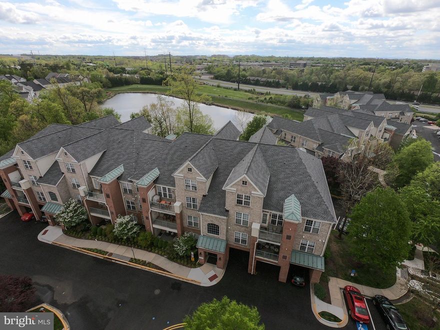 Amazing condo with tons of upgrades! 1172 Sq feet completely renovated unit from top to bottom, walking distance from Reston Town Center & future metro station. Two bedroom & Two full bath, with hardwood floors for entire unit, gas fire place, crown moldings, newer kitchen cabinets with w/ marble countertop and stainless steel appliances.  Beautiful crystal chandeliers, recess lights, master bath w/ frameless shower, designer bathroom cabinets/tiles,  Second bath updates w/ designer finish.  Excellent amenities - pool & club house. Must See Inside!