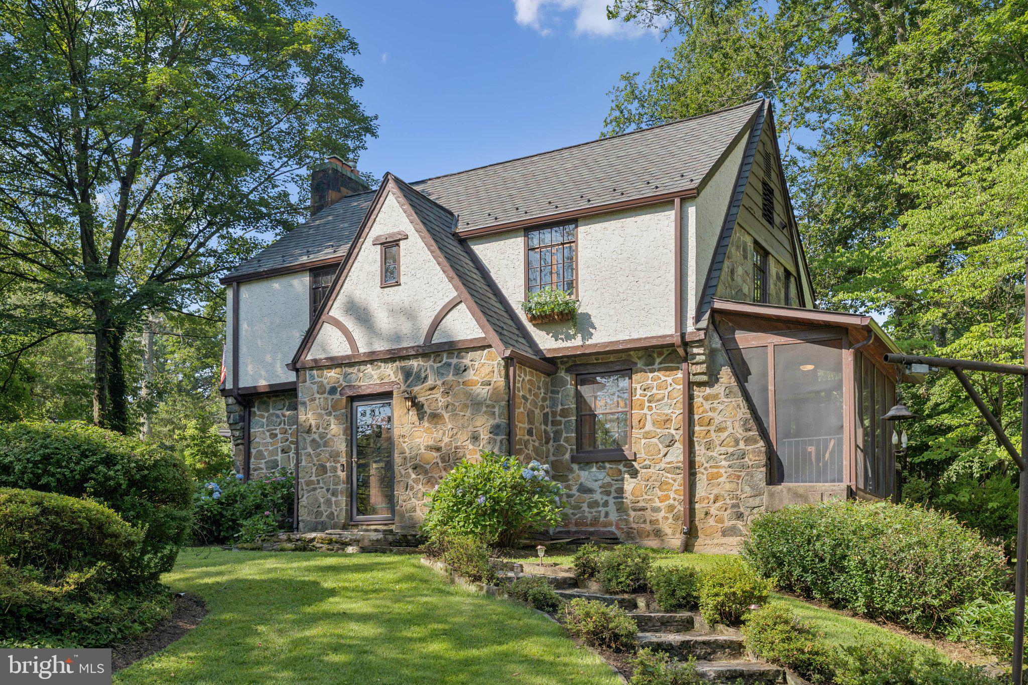 Charming, newly renovated, Tudor home: 3 bed/3 bath + a bonus room featuring a wall of windows, in the desirable and centrally located Woodhaven neighborhood. Relatively large lot includes an additional parcel of land--giving you plenty of opportunities to enjoy this newly renovated house as is, or expand. Some highlights of the home include a large family room with stone fireplace, high ceilings, and exposed beams; bright, sunlit bedrooms; a finished basement with full bath; a screened-in porch; a new roof (Nov ‘23); ample storage; and many custom original finishes. Mature landscaping adds privacy and beautiful views from nearly every room. 2024-25 Schools are Burning Tree Elementary, Pyle Middle School (walkers), Walt Whitman High School