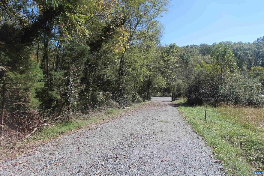 Excellent location to build your dream home.  Secluded wooded land, close to North Garden, Crossroads Inn , UVA, and Charlottesville.  Many local wineries are nearby including Pippin Hill.