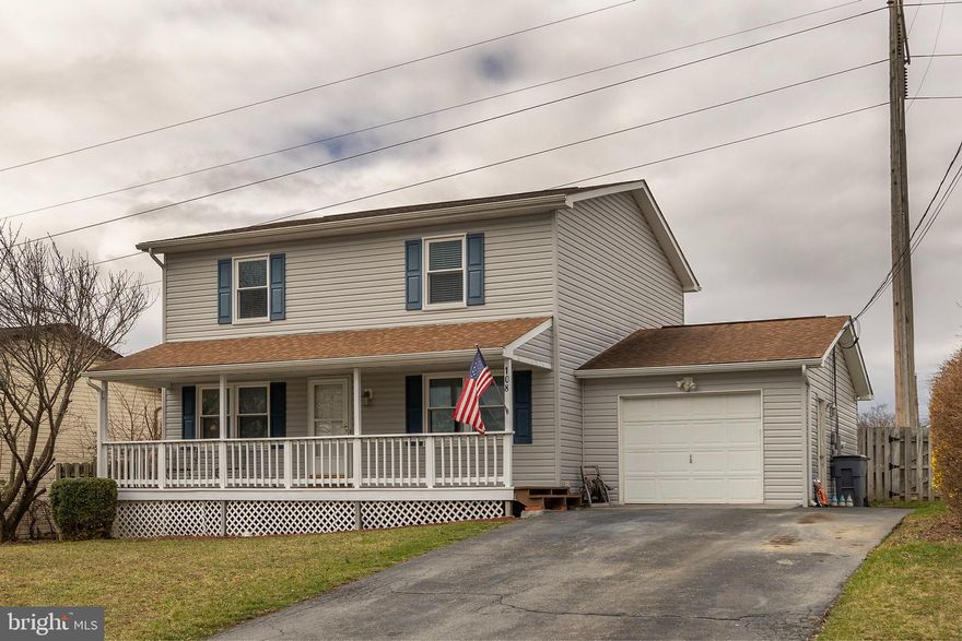 Spacious 3 Bed, 2.5 Bath Colonial with covered front porch & screened-in deck! This charming Colonial offers plenty of space, featuring a large covered front porch, a fenced backyard, and a screened-in deck—perfect for relaxing or entertaining. Inside, the main level boasts durable laminate flooring, a well-appointed kitchen with a breakfast bar, and both formal living and dining rooms. The family room, located off the kitchen, provides additional space for gathering. Upstairs, the three generously sized bedrooms have brand-new carpet.  The full, unfinished basement offers potential for customization, with rough-in plumbing ready for an additional bathroom and a lower level laundry room includes a utility sink for added convenience. . Updates include windows replaced in 2022, a water softener installed in 2022, vinyl siding, shutters, and gutters replaced in 2019, a roof from approximately 2015, HVAC and furnace from approximately 2011, and a water heater from 2014. All appliances have been updated except for the refrigerator. Located close to the high school and elementary school, this home offers easy access to I-81 and Rt-7. With no HOA restrictions, you can enjoy the freedom of homeownership without additional fees. Flooring and vanities will convey to the new owner. Don’t miss the opportunity to make this beautiful home yours—schedule a showing today!