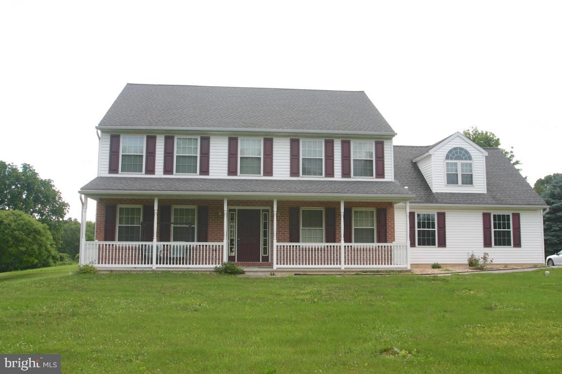 Country home on 5.5 rural acres with fantastic views including your own woods and creek. 1st flr room ideal for Br, office, library or your use. Full bath 1st flr offers walk-in tub w/jets making the room perfect for handicap or elderly member of the family. Large 2nd flr owners suite has attached office/study with small kitchenette, full bath and storage room.