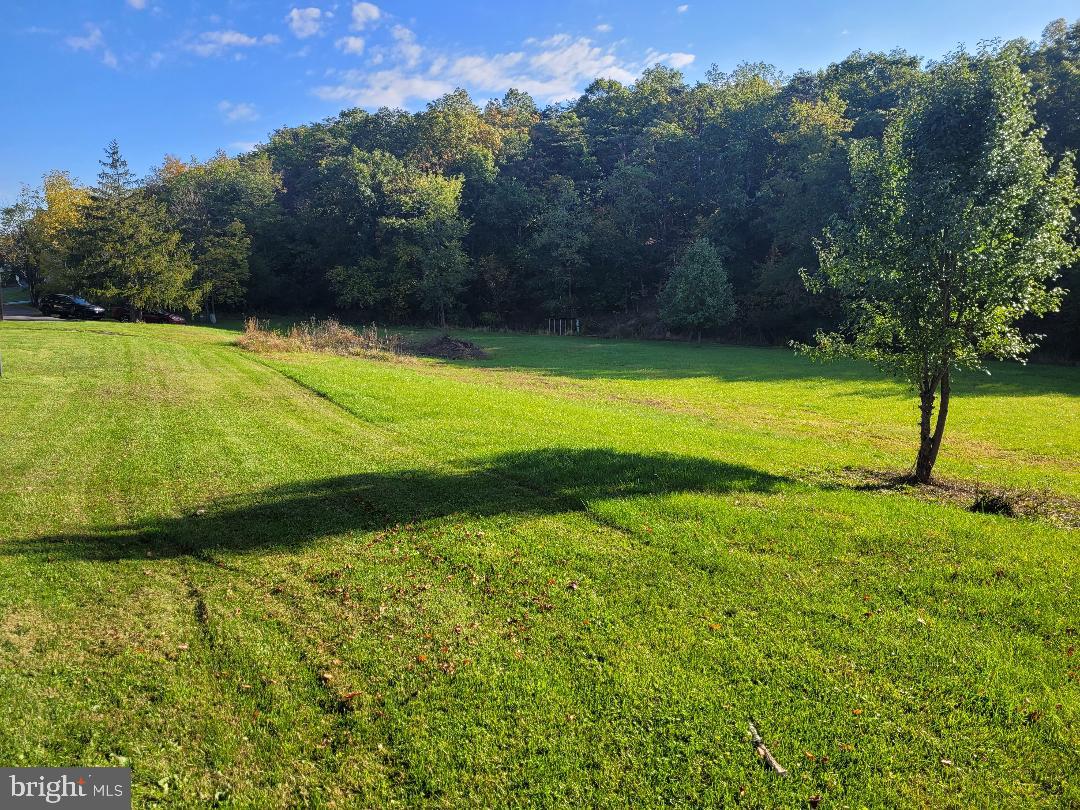 Property is located in beautiful Hunt Club Subdivision and is one of the last lots available to build your dream home. In addition, this property allows for townhouses and other commercial opportunities and provides easy access to Cumberland and other amenities. This a great private lot with endless possibilities.