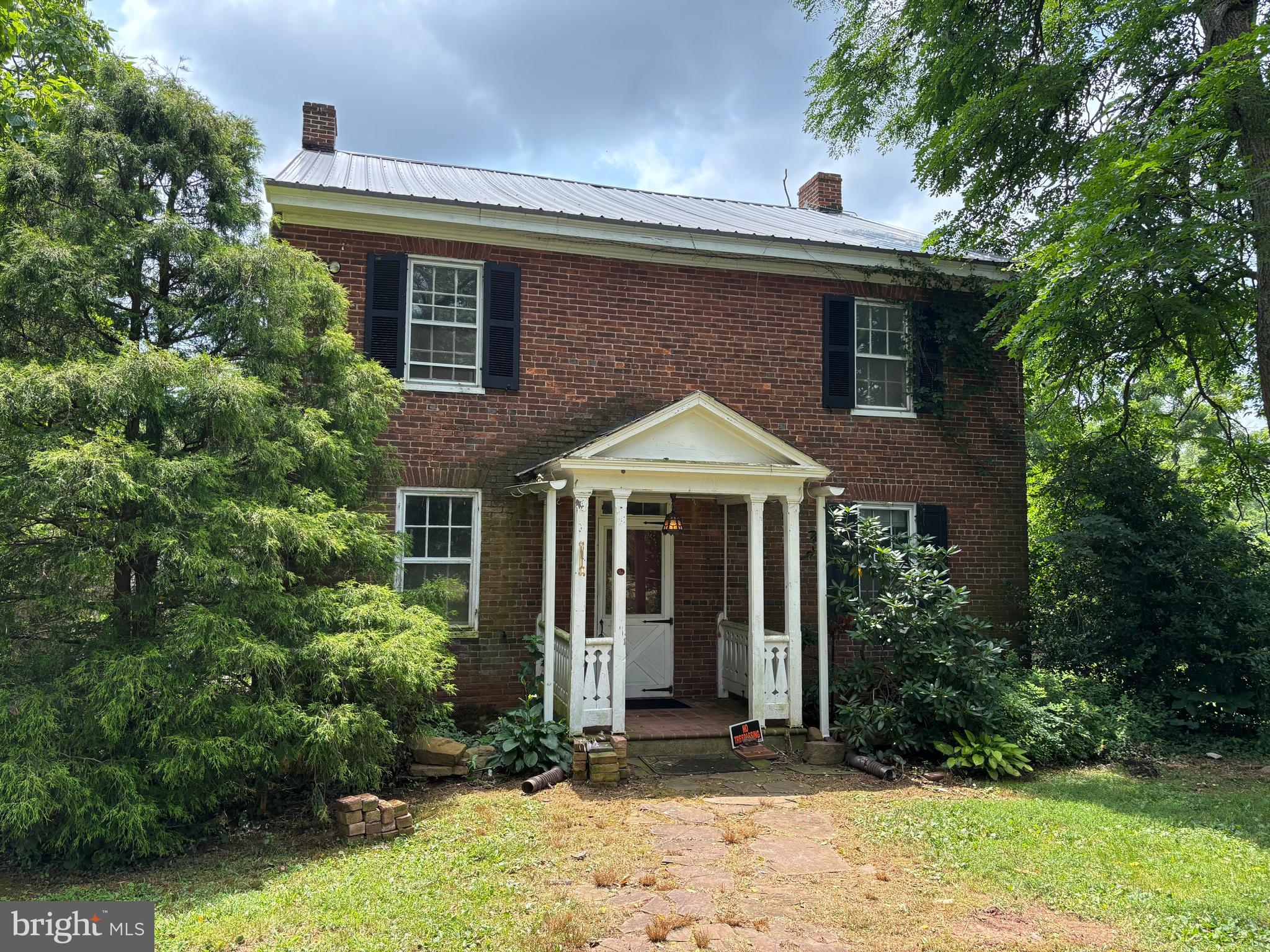 Upcoming auction on Saturday September 6th at 12 noon. Let this long scenic driveway lead the way to the property of your dreams. Sitting on 106 acres, with 90 being tillable, and 16 being woods, this property entertains endless possibilities. In addition to the acreage the property boasts a 3 bedroom, one full bath farmhouse, a spring house, A two story barn, A two car garage, and two outdoor sheds. This property encompasses views that will take your breath away, endless types of wildlife, And plenty of room for all types of recreation. Don't miss out on the chance to make this unique, one of a kind property yours. This price in no way represents min, starting, or acceptable bid. It is used as a guide to find the home.
