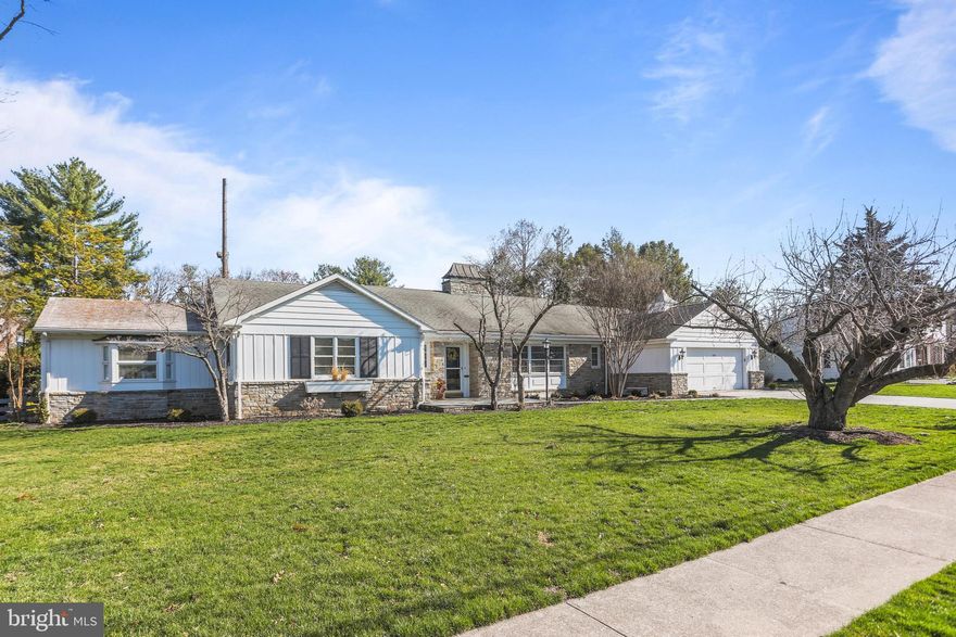 New Spring exterior photos are coming soon! One-of-a-kind in both design and history, this custom-built stone residence offers expansive living spaces, resort-style amenities, and a private, park-like setting rarely found within town limits. Step inside to discover expansive living spaces, quality construction, and thoughtfully designed areas that make everyday living and entertaining equally enjoyable. The main level unfolds with new hickory engineered hardwood flooring that carries throughout the primary living spaces. Radiant hot water floor heating runs through much of the home providing consistent and efficient comfort. Natural light fills the beautifully updated gourmet kitchen, where granite countertops, new high-end appliances, and generous cooking space create a true centerpiece of the home. The kitchen connects effortlessly to the heated sunroom and overlooks the backyard, offering a bright and welcoming space for gathering. Nearby, two functional fireplaces add warmth and charm to both the formal living room and the sunken family room. Down the hall, the main level continues with three bedrooms and three full bathrooms. The owner’s suite is complete with a large private bathroom featuring double vanity sinks, a walk-in closet, and a generous soaking tub. The lower level adds more than 2,000 square feet of finished space and is built with durability in mind, featuring 10-foot ceilings, steel beam support, concrete construction, and full basement dehumidifer. A certified storm shelter to be exact. This level includes a large recreation area, bedroom, full bath, workshop, home gym, and extensive storage. With its own separate entrance, the space easily functions as guest or multigenerational living. Additional highlights include custom storage throughout, a full-length house attic with excellent potential for even more storage, and an oversized attached two-car garage, and a detached one-car garage. Moving outdoors, the setting transforms into a private retreat on nearly 1.5 acres while still being close to everyday conveniences. A showstopping 60,000-gallon concrete pool, recognized as one of the largest private pools in the borough, serves as the focal point of the outdoor space. The pool house enhances the experience a half bath, refrigerator, pool storage, new non-slip flooring, and pre-wiring and plumbing for a future outdoor shower. While the home is serviced by public water and sewer, two functional wells remain on the property and can be used for gardening or filling the pool. Originally built and owned by members of the Utz-Rice family, the home also carries a unique connection to Utz Brands, reflected in its solid construction and distinctive details. Combining history, generous living space, and exceptional unique amenities, this is a truly remarkable and memorable property!