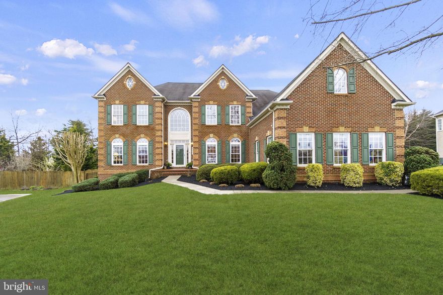 AN ENTERTAINER'S GALORE!!! This distinctive  "Clifton Park" model  estate home built by NVHomes is the definition of luxury and comfort. It is perfectly situated on  a .69 acre lot backing to a wooded area,  in Loudoun's sought-after and upscale  community - The Lakes at Bella Terra . This beautifully maintained home offers 7,400 square feet of exquisite living space spanning over 3 levels, with a modern open floor plan, featuring deep moldings, two staircases, architecturally striking picture and bay windows, a speaker system, and high ceilings. 

The  grand two-story foyer and it's dramatic staircases welcome you home. The main level offers a formal living room and dining room , a large private office, a powder room, a spacious laundry room, gleaming hardwood floors and ornate chandeliers. 

The two-story great room is in the heart of the home with custom designed recessed wall niches, a gas fireplace and a wall of windows overlooking the backyard. The gourmet kitchen is every Chef's dream with a massive center island, granite countertops and stainless steel appliances. It has ample cabinet space, a walk-in pantry in addition to a butler's pantry, complete with a cozy morning room where you can enjoy your meals with great views. 

The owner's suite  hosts a sitting room, a massive his & hers walk-in closet and a custom designed timeless bathroom which received the Wood Diamond Award in 2021. There are three additional expansive bedrooms, all with walk-in closets and en-suite bathrooms, on the upper level.

The fully finished lower level is spacious and offers plenty of space to play and entertain. It includes a full bar, exercise room with built-in mirrors, billiards area, former wine room which is now used as a den, recreation room with gas fireplace, a full bath, a storage room and an intimate theater room with tiered seating.

Recent updates include full interior painting,  award winning primary bathroom remodel, new storm door, new refrigerator, new door knobs, new carpet & padding, plantation shutters in the family room, LVP flooring in basement, installation of fence, resurfaced asphalt driveway and epoxy garage floor.

The outdoor living spaces feature a large screened porch, two custom decks with composite flooring, pergola, and professionally manicured gardens and lawn. Never run into parking issues with a 3-car side entry garage, ample parking space in the driveway and street parking. 

Not only does this stately home have all the bells and whistles, it is also located in a desirable location. Close to Brambleton shopping center and Broadlands shopping center. Only 1mile to the Silver line metro and 15 minutes from Dulles International Airport. Close to major commuter routes such as Dulles Greenway, Rt 28 and Rt 7.