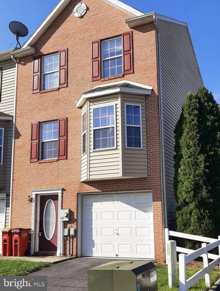 End unit 3 story townhouse with garage, 3 bedroom , 2 1/2 bath. Floating click and lock flooring throughout. Stainless steel appliances & brand new dishwasher.  Roof is in the process of being replaced.  Centrally located & a few minutes away from downtown Charles Town and Ranson.