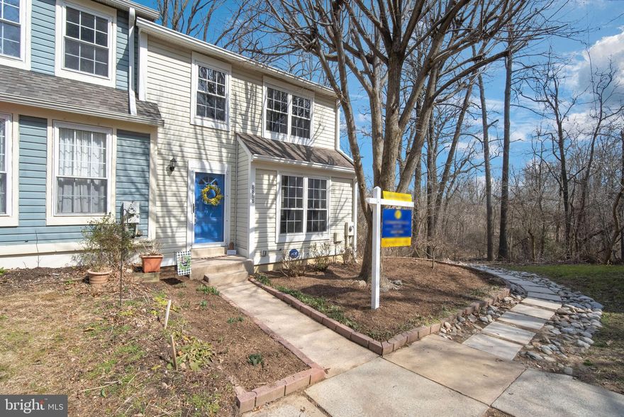 Fabulous end-unit home in much desired Stonebrook neighborhood! Backing to woods and a stream, this move-in ready home is conveniently located to all of our areas wonderful amenities.  Freshly painted with new flooring, this home features an abundance of light in the living and dining areas.  Cherry cabinets, granite counters, stainless appliances, and a fireplace make the kitchen the heart of this home. The large deck off of the kitchen is a great place to relax and enjoy the beautiful surroundings. The upper level has been transformed into 2 spacious bedrooms, each with private bath.  A great lower level family room, with wood burning fireplace and built-in cabinets, exits on to the private patio.  The work has been done: your only job it so unpack! Seller respectfully requests that any offers be submitted for consideration by Saturday at 5:00.