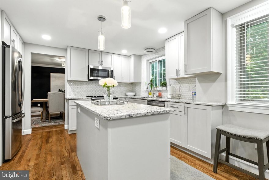 Exceptional Value! Experience refined living in this elegantly updated home set on over an acre of private, serene land. With 2,800+ sq ft across three beautifully finished levels, this residence blends timeless design with modern comfort. The open layout features gleaming hardwood floors, a gourmet kitchen with stainless steel appliances and granite counters, and a cozy fireplace. The expansive deck provides an ideal setting for large-scale outdoor entertaining or quiet relaxation.
Enjoy peace of mind with recent upgrades: a brand-new roof, new siding, and fresh paint both inside and out. Car lovers will appreciate the attached & detached 2-car garages plus resurfaced driveway for 8+ cars. Bonus: Living, dining & bedroom furniture can be conveyed at the buyer’s request! A perfect blend of style, comfort, privacy, and exceptional value. An opportunity you cannot miss!