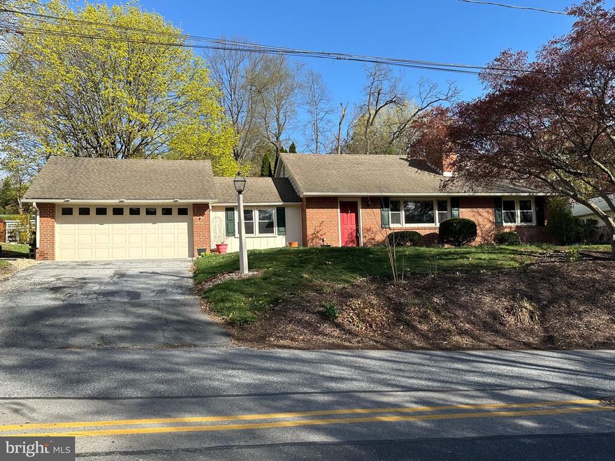 Steps away from West Shore Country Club & Pool, this lovely all Brick Ranch home features : 
3 bedrooms, 1 and 1/2 baths,  updated shaker style kitchen with granite countertops and all stainless steel appliances.  Washer and Dryer is included.  The living room has a lovely wood burning fireplace and bay window.  There are beautiful hardwood floors throughout, cozy den with a sliding door that opens up to the backyard patio.   The basement has a finished family room with fireplace and the other side has the laundry and utility area with plenty of space for a future work shop.  Radon System  has been installed and a one year Homeowners Warranty is included and will be provided at settlement.