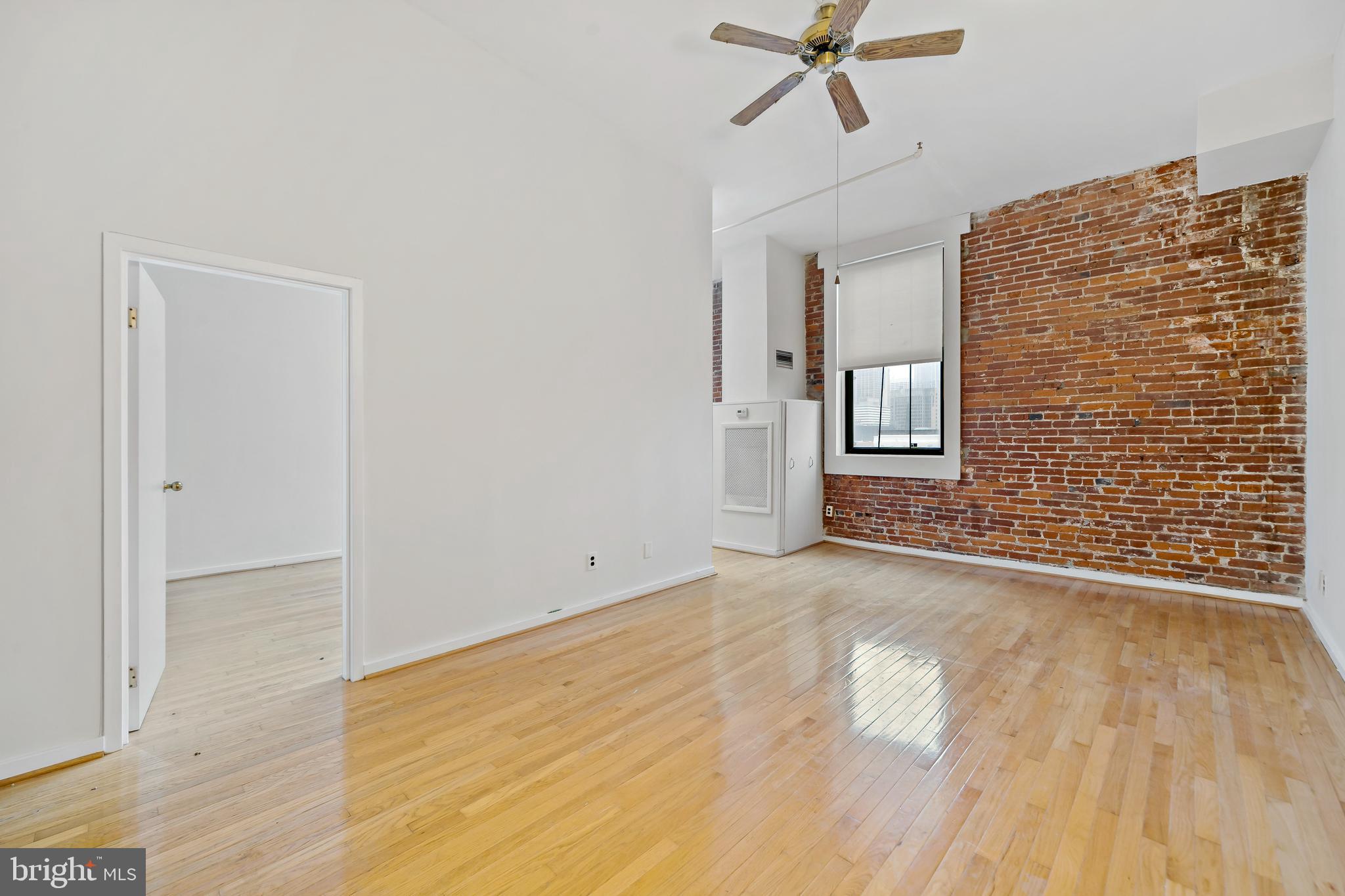 Spacious and light-filled one-bedroom, one-bathroom condo for sale in Philadelphia’s vibrant Chinatown neighborhood. Situated on the 5th floor, this unit boasts abundant natural light, soaring ceilings, and charming exposed brick, wood beams, and hardwood floors. The open layout includes an office alcove that can easily be converted into a second bedroom for added flexibility. Enjoy the comfort of brand-new central air, ample in-unit storage, and additional storage space in the basement. The oversized bathroom features wood ceilings, a tiled floor, and a convenient laundry closet. Ideally located near Center City’s top restaurants, public transportation, and just a short walk to the Fashion District shopping mall, this well-maintained condo offers the perfect blend of character and convenience. *Some photos are virtually staged.