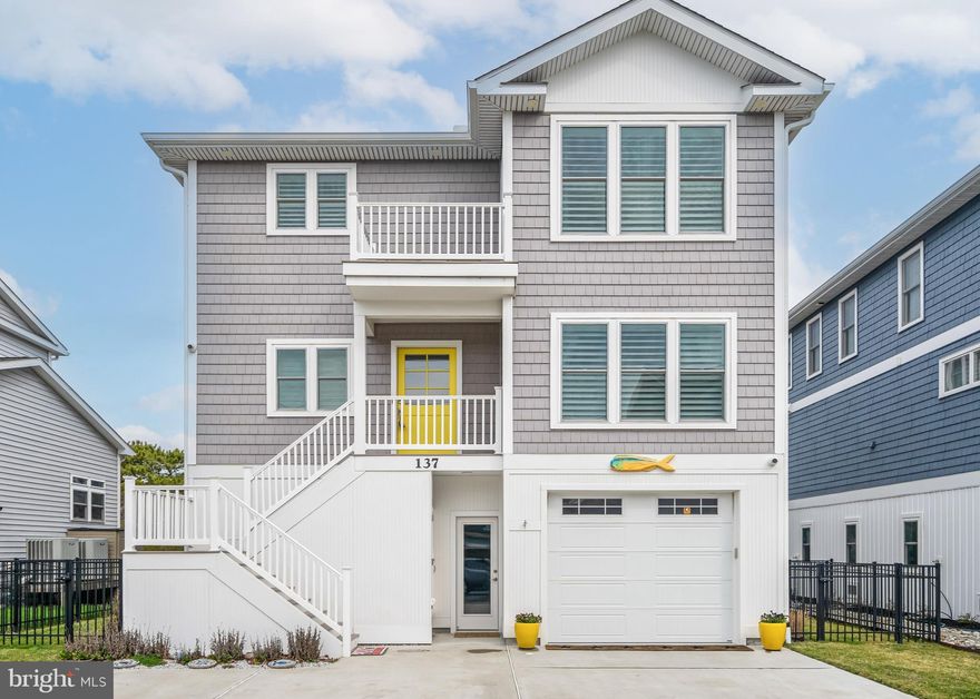 Absolutely stunning waterfront home, located steps away from the beaches of South Bethany. No detail was overlooked in this brand new build in 2021. Situated on the canals of South Bethany, enjoy your days and evenings on your own private dock. This thoughtfully designed three level home features four spacious bedrooms, four full and two half baths, and approximately 4000sf of living space. The entry level has a two car garage, with doors opening to the front of the home and opening out to the expansive canal-front patio, family room,  ample storage spaces, and the Elevator which has access to all three floors. The patio has gorgeous hardscaping, complete with a built-in grilling area for al fresco dining. The dock has power and water running to it, great for cleaning your boat after a day on the bay. The second level has three bedrooms, two with ensuite baths, a hall full bath, large laundry room, and a back porch looking out to the water. The third level is an entertainer’s dream and coastal living at its best! Featuring a gourmet kitchen with custom cabinetry and a large island with a beautiful Blue Brazilian Quartzite countertop. The kitchen is open to a large family room with a gas fireplace and an additional sitting area, perfect for game night, or a great dining area looking out to the water below. The views from this level are fabulous!  On this level you will find the large primary bedroom with a walk-in-closet. It has its own south facing private deck, perfect for seeing the sunrise and sunset! There are so many thoughtful upgrades on this wonderful home: automated shades, speaker system throughout, entry way stair lighting, irrigation system, lighted dock, and so much more. This gorgeous coastal residence, which has never been rented, must be seen to be appreciated. Call to schedule your private tour.