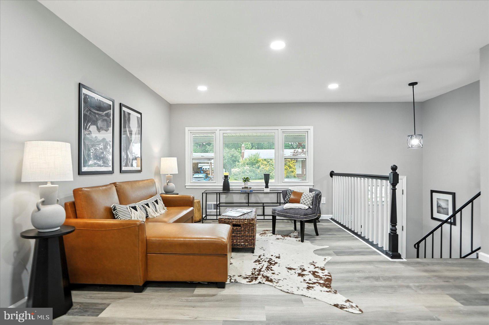 Discover the home of your dreams with this stunning, completely renovated home in Severn. This remarkable property showcases the epitome of lovely living. Step inside and be captivated by the grandeur that awaits you. Every corner of this meticulous home boasts exquisite craftsmanship and attention to detail. From an open layout to all the fine finishes, no expense has been spared in creating an extraordinary living space. This spacious plan seamlessly connects the living, dining, and kitchen areas, creating an ideal environment for entertaining family and friends. The kitchen is a chef's delight, featuring top-of-the-line appliances, sleek countertops and ample storage space. The primary bedroom and additional beds and baths offer comfort and privacy for the entire family. Experience outdoor living at its finest in the expansive backyard. Whether you're hosting summer cookouts or simply enjoying an evening under the stars, the possibilities are endless on the large deck. With easy access to major highways and transportation, commuting to work or exploring different cities is a breeze. Welcome Home to 1415 Larch Rd.