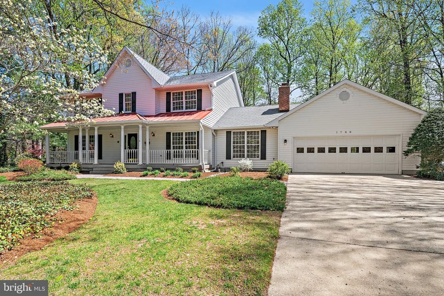 Classic custom-built home with New England charm, featuring a large front porch and red standing-seam roof.  Located in the Crofton Triangle and within walking distance to the Crofton Swim & Tennis Club, this home sits on an approximately 25,000 sq ft flat lot with a huge backyard. The interior has been newly painted with new carpet throughout. The main level offers multiple spacious living areas including two large family rooms with fireplaces, a dining room, and access to a large deck off the family room and kitchen overlooking the backyard. Main-level washer and dryer for convenience. The spacious lower level includes windows, a bedroom, full bath, rec room, and plenty of storage space. The property can be purchased with a *buildable lot*, that's  approximately 25,000 located  to the rear of the home. Lot price is $230,000.  See separate lot listing for details, MDAA2140262. The house will be sold first, but both may be negotiated together, if desired.  Sellers prefer Dan Collins at CLA title. Available April 10th for showings!