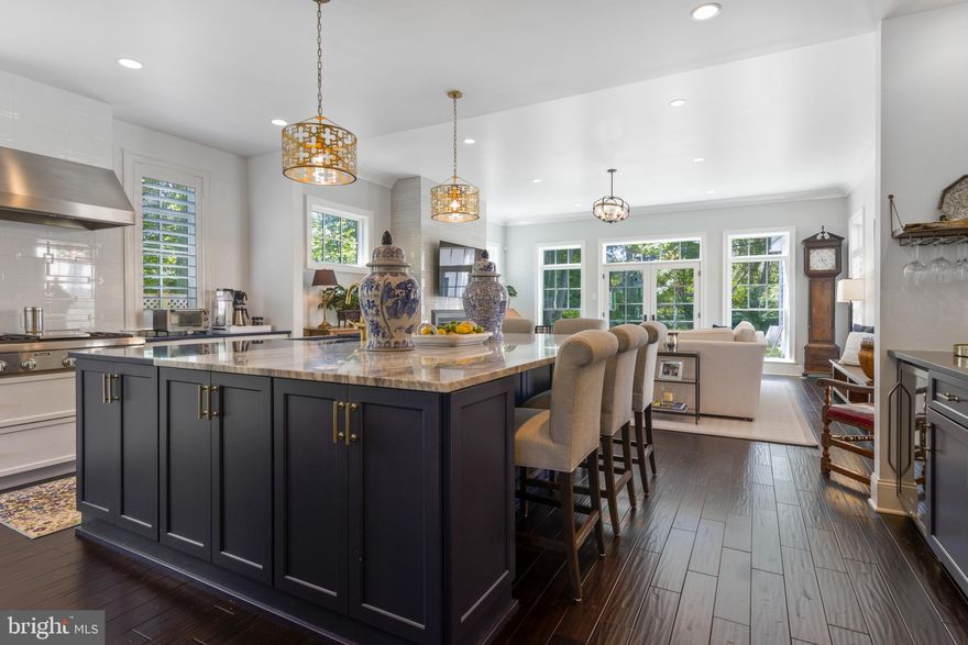 NEW PRICE $1,699,000. Can you believe it...the house you missed 2 years ago because it sold before it hit  the market, now could be yours??  Well your dreams can come true as this absolute masterpiece, which was taken down to the previous owners  foundation and rebuilt, is now  going to be available again!  Rarely found in the heart of South Wayne, everything in the entire home is brand new and exquisitely appointed with the finest of materials and finishes.  It exudes  a sense of warmth and welcome from the street as  it eloquently blends into  the wonderful, established  tree lined neighborhood.  From the moment you open the front door, you can feel the graciousness of this home- where every room is perfectly proportioned  flowing  natural and effortlessly with no wasted space.  The balanced floor plan offers one the opportunity to live as formally  or informally  as you wish, having all of the right spaces desired today.  The Foyer is flanked by a lovely Dining Room promising to provide unforgettable meals and memories, while a large Office with built-in desk and bookcases can be found on the other side.  Natural light continues to stream into the soul of the house featuring  a spectacular Kitchen and Family Room  that will take your breath away.  The gourmet Kitchens epitome is a stunning natural stone island enticing many to gather from morning till night while meals are prepared and shared with fiends and family. The love, laughter and conversation continues into the adjoining  Family Room,  featuring a  spectacular fireplace with outside access to a beautiful flagstone Patio with newly built knee wall and grill enclave. This  comfortable, functional and inviting First Floor is completed by a perfect Mudroom with many cubbies  and large Powder Room.  A stunning staircase leads one to the Second Floor where  a glorious private Master Bedroom  Suite awaits... a true treat to begin and end ones day in!! This private oasis has soaring ceilings that are warmed with hand hewn beams and a luxurious marble  Master Bath, with His and Her Walk-in closets.  Additionally, on the Second Floor there  is a wonderful en- suite Bedroom and Bath, with a Third Bedroom and lovely Hall Bath. This floor is completed by a very convenient  and spacious Laundry Area. The Third Floor has 2 additional large Bedrooms with one currently being  used as additional family/exercise space and is complimented by a Hall Bath.  All of your storage needs are taken care of throughout the homes many closets and Basement, and a one car over-sized detached Garage is beautifully tucked away so this elegant homes street presence is the show stopper.  Don't miss this  perfect combination of design and functionality with architectural details that profoundly enhance the home's atmosphere and compliment  the neighborhood!! Move right in to this  one-of-a-kind property where you will not need to do a thing other than start enjoying wonderful walks to Wayne!! All showings begin Wednesday August 5th.