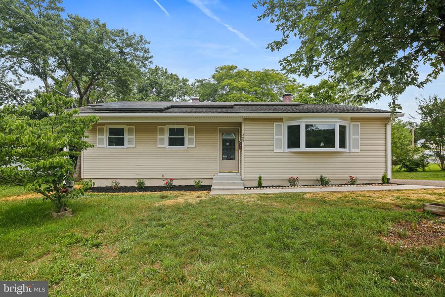 You’ll love living in Maryland City! Enjoy single-level living with 3 bedrooms, 2 full baths, and over $190K in upgrades throughout! Cooking is easy in the updated kitchen with quartz counters and white shaker cabinets. Enter the sunlit living room through the newly created archway near the side door by the driveway or around the other side of the wall through the dining area. Three bedrooms and two full baths are just down the hall.

The basement has freshly painted floors, new windows, and a new half-bath adjacent to the laundry room. There’s plenty of space to create a home office, playroom, workshop, etc.! This sparkling gem is situated on a corner lot, and close to major commuter routes (32, 295), Ft. Meade, NSA, Baltimore, and D.C. but is tucked away in the neighborhood.

This rancher has gotten a stunning facelift with upgrades including new LVP flooring & carpeting, painting, appliances, drywall, steps and walkway, concrete patio in the yard and more. Leased solar panels on the roof means lower electric bills! Big ticket items like the HVAC and windows have been taken care of!

This is an as-is estate sale, and sellers prefer a quick close.