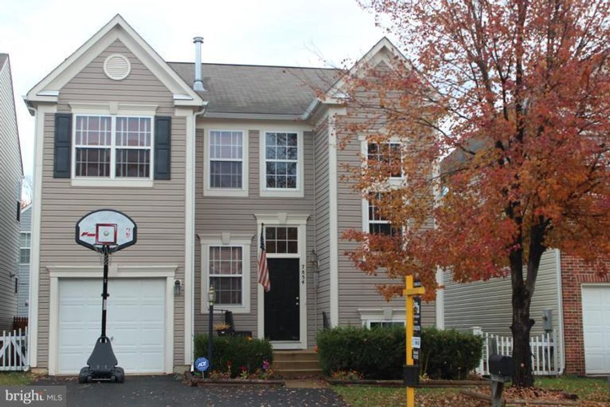 *MOTIVATED SELLERS! REDUCED PRICED TO SELL! * 5 BR/3.5 BATH home. Open floor plan, Hardwood foyer and eat-in kitchen with granite countertops and island. Open family room off of kitchen.  Upgraded Pergo throughout basement and 5th bedroom. Basement has open floor plan w lots of natural light. Walking distance to VRE, restaurants & shops.