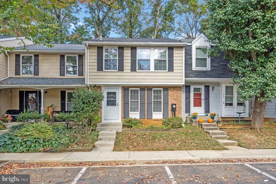 Surprisingly large and recently updated townhome in an outstanding location just two blocks from Rise Up Coffee, Green Valley Groceries and Loughlin's Restaurant in Bay Hills Shopping Center.  Hardwood and laminate wood flooring throughout.  Spacious eat-in kitchen with pass thru to dining area has ample counter space.   Open concept living and dining room with recessed lighting,  Deck off living room that backs to woods and includes the table and propane gas grill.  Primary bedroom with walk-in plus two other closets.  Generously sized bedrooms.  Full Bath on the upper level has been totally renovated.  Lower level has FR, totally renovated full bath and laundry/utility plus walk-out to yard.  Backs to trees for privacy.  Lawn maintenance included in rent. Pets case by case under 25 lbs. only.  Long term lease preferred, minimum is twelve months.  Minimum credit score is 650.