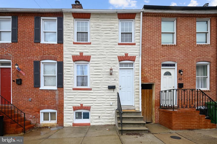 Great Federal Hill row home just a few blocks from the park!  A brand new kitchen, new carpeting, and fresh paint really make this home shine.  The finished basement could act as a second bedroom with a generously sized full bathroom.  Come see how much charm this home has to offer!