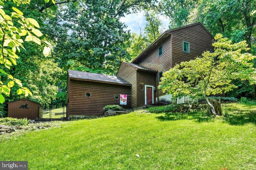 Unique affordable opportunity! Tucked away and nestled on a picturesque .59 acre wooded lot, 4 bedroom, 2 1/2 bath contemporary style home situated in the private community of Cecil Manor with close proximity to I-95, Rt 40, The Delaware State Line and The University of Delaware. Main level details include beautiful and well maintained bamboo flooring, spacious living room, formal dining, laundry, half bath and a kitchen with open sight lines to a generously sized family room. Kitchen details include a peninsula with a Corian countertop and seating, 2 separate double sinks, pantry and newer stainless steel refrigerator. Bamboo flooring continues on the upper level, featuring 4 bedrooms, including a primary bedroom offering an attached bath and roomy walk-in closet, as well as an additional full bath. Additional property details include a 2-car garage with convenient basement access, patio, large gardening shed with electric and a side fenced area, ideal for children and pets. A wonderful opportunity for the new owners to add their personal own touch with a few modern updates. If you are searching for a conveniently located, spacious and affordably priced place to call home, your search is over...168 Creek Drive...Welcome Home!!!