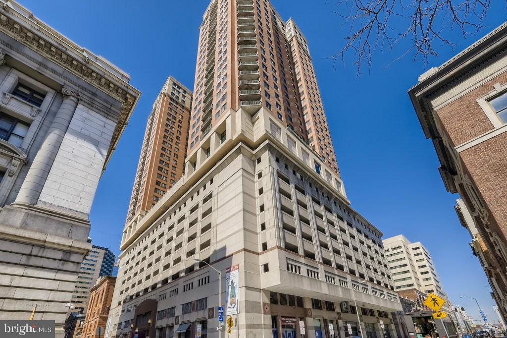 Fabulous Southern Water and City Views from level 28. Wood flooring, granite counters, stainless appliances, gas fireplace, and parking in attached garage included. Secure elevator building with 24-hour desk, parking attendant, on-site manager, rooftop two-level pool, gym, business center and party room. Excellent downtown location a block and half from the water! Split bedroom design, great for roommates. ALL UTILITIES INCLUDED except electric.