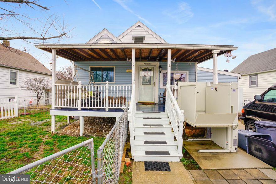 Charming home with lots of outdoor space, great for entertaining. Enjoy relaxing on your covered front porch or in your beautifully lit sunroom room overlooking the spacious backyard. First-floor bedroom and bathroom, upper level has 2 smaller bedrooms. The kitchen has updated stainless steel appliances and a separate dining room.  Brand new A/C unit and furnace!  Conveniently attached one car garage. A must see!