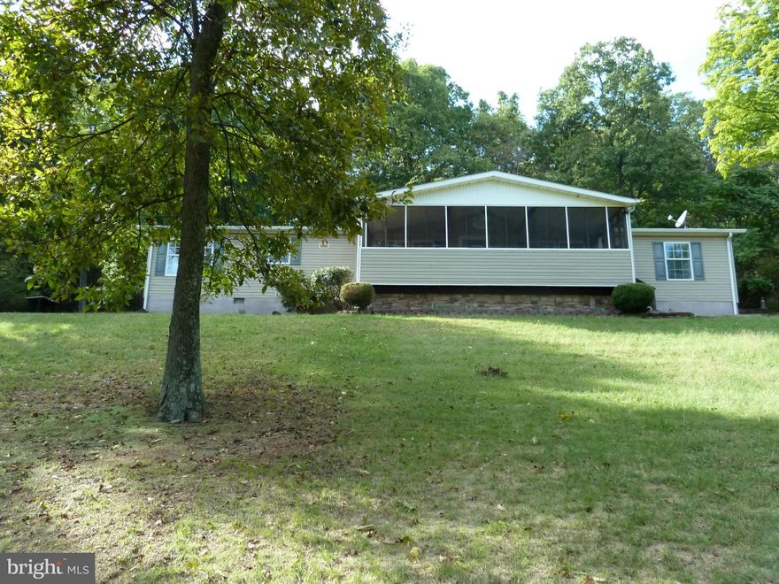 Large double wide home on permanent foundation w/ lovely views of the valley. House needs  appliances,  repairs including HVAC, flooring, paint, driveway. Could  make a lovely home on 2.19 acres of land. Owner occupant  offers only  until  10/24.Seller paid Home warranty available to owner occupants if requested in the initial offer .Sold as is, all information should be verified by buyers .