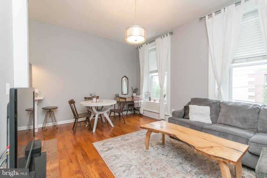 Welcome to your new city oasis! This 1 bed / 1 bath condo has your name written all over it—especially with your very own private roof deck (hello, skyline views!) and a cozy shared backyard for those chill weekend hangouts.

Inside, you’ll love the mix of old-world charm and fresh modern finishes. We’re talking nearly 15-foot ceilings that make the space feel extra grand, hardwood floors throughout, and a stylish eat-in kitchen with quartz countertops and stainless steel appliances—perfect for brunching at home or hosting your foodie friends.

The bedroom is super spacious with a big closet and custom storage, so you can finally ditch the storage unit. Plus, there's even more room for your stuff with a huge storage closet in the basement.

And the location? So good. You’re on a quiet, residential block, but just steps from all the action. Walk to Center City or check out the incredible restaurants and nightlife nearby and some of the city's best restaurants are practically in your backyard. Whether you're grabbing coffee, catching a happy hour, or heading to dinner, you're right there.

Bottom line: This place has the vibes, the views, and the neighborhood perks you’ve been looking for.