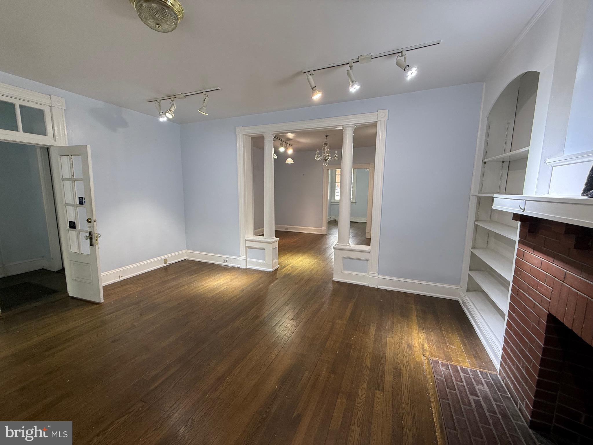 FANTASTIC opportunity in downtown Fredericksburg. Charming historic retail building with apartment above the shop AND lot next door for development. Apartment is tenant occupied.
Retail space is bright and open with the character you would expect on Caroline Street. Beautiful wood floors. Tons of foot traffic and storage spaces. Showings by appointment only, please schedule online.