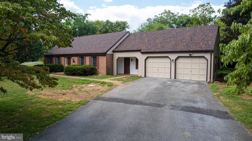 Just Listed!! 

Welcome to this exceptionally spacious brick rancher, nestled on an unrestricted 1.6-acre lot.  The level, beautifully maintained yard offers ample space for outdoor enjoyment and yes, it’s animal friendly.  The previous owner kept a horse, and there's a charming small barn tucked away in the back.  Inside, this 3-bedroom, 2-bath home has been thoughtfully updated throughout while preserving the original character that makes it truly one-of-a-kind.  Major upgrades include a new roof, gutters, flooring, cabinets, countertops, vanities, toilets, appliances, and fixtures, giving you peace of mind and modern comfort.  The layout is both functional and inviting, featuring a front-entry two-car garage, a mudroom with laundry, and a covered front porch that leads into a spacious living room with a cozy wood-burning fireplace.  At the heart of the home is a beautifully appointed kitchen with soft-close cabinets, granite countertops, and stainless-steel appliances.  Above the garage, you'll find access to a large attic space for additional storage.  
A standout bonus is the expansive sunroom, perfect for entertaining, hosting family gatherings, or simply relaxing while taking in the serene surroundings.  The mostly finished basement offers endless possibilities: the finished side is ideal for a game room or home gym, while the unfinished side, with utility access, is perfect for a workshop or extra storage.  A basement walkout leads directly to the backyard.   Enjoy the tranquility and freedom of country living, all just a short drive from local amenities.  With its generous space, thoughtful updates, and unique features, this property is a rare find.  Do not miss this opportunity to make this house yours!