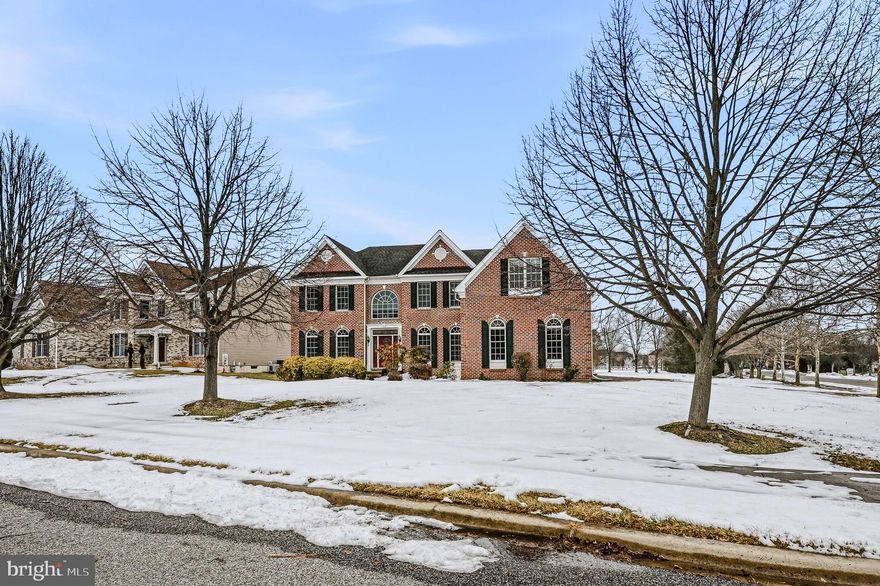 Welcome to 211 Audubon Drive, an extraordinary luxury residence nestled in the prestigious community of Red Lion Chase.  . Perfectly positioned in one of the area’s most desirable enclaves, this exceptional home offers refined living, timeless elegance, and Toll Brothers' uncompromising attention to detail. From the moment you arrive, the home’s stately presence on a corner lot and manicured grounds set the tone for what awaits inside. A grand two-story foyer welcomes you with soaring ceilings, a butterfly staircase, architectural millwork, and an abundance of natural light. Thoughtfully designed for both everyday comfort and elevated entertaining, the expansive floor plan seamlessly blends formal and informal living spaces.  A formal living room sits to one side and an impressive formal dining room with a tray ceiling to the other.  Gleaming hardwoods lead into the heart of the house where you'll find the gourmet eat in kitchen.  You'll enjoy entertaining in this showplace featuring premium appliances, custom 42 inch cabinetry, an oversized center island with seating and designer finishes.  It opens effortlessly to a bright sunroom with walls of windows that frame serene outdoor views. Overlooking the spacious, premium lot and the 670sq ft Trex deck, it's a beautiful place to gather.  Our seller loves to watch the birds from this spot!  The family room spans 2 stories and has a wood burning fireplace as a focal point.  Next to that is a half bath, the private study with French doors and access to the massive unfinished basement with walk up - ready to be finished, should that be your choice. Upstairs, retreat to the luxurious primary suite, a private sanctuary complete with a double sided gas fireplace, spa-inspired bath, dual vanities, a Jacuzzi tub, and two spacious walk-in closets. Generously sized secondary bedrooms offer comfort and privacy for family and guests alike.  Bedroom 2 is a princess suite.  Additional features include central vacuum system, surround sound with central component closet, first floor mud room and laundry, and a 3 car turned garage.  Red Lion Chase offers amenities, a clubhouse with gathering space, swimming pool and hot tub, basketball and tennis courts and a fitness center.  Located just minutes from shopping, dining, and major commuter routes, 211 Audubon Drive presents a rare opportunity to own a distinguished home where sophistication meets modern convenience. Experience elevated living at its finest.