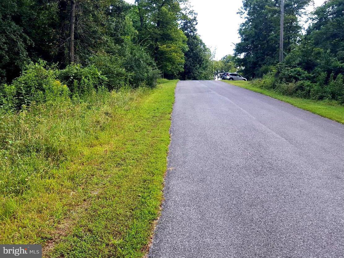 Not many lots like this!!! Close to town. 2.26 acres in lovely development. Off I-81 on tuscarora pike. Build your dream home. Property has been perked and ready to build.
