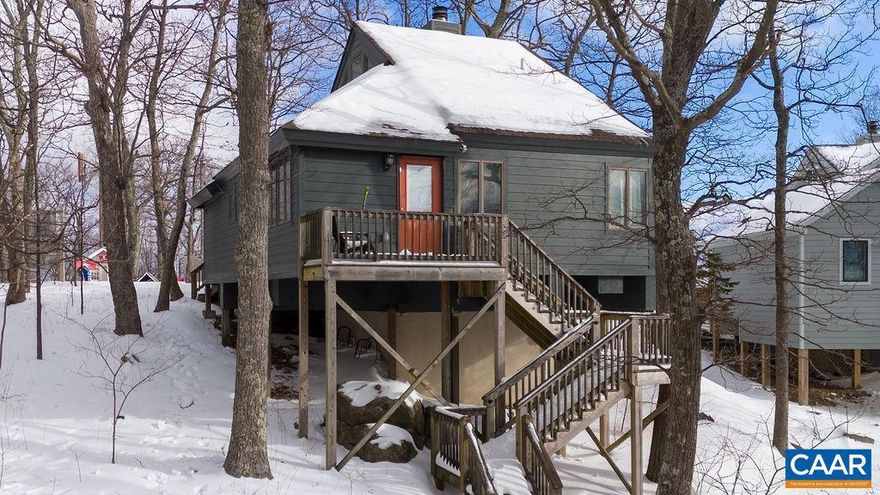 Welcome to mountain living at its finest in the heart of Wintergreen Resort! This coveted ski-in/ski-out property offers the perfect blend of adventure and comfort, positioning you moments from the slopes while surrounded by the natural beauty of Virginia's Blue Ridge Mountains.  The home's strategic location provides direct access to Wintergreen's renowned ski facilities, making it a dream come true for winter sports enthusiasts.   Whether you're cozying up after a day on the slopes or entertaining friends and family, this home provides the perfect setting for creating lasting memories. The three well-appointed bedrooms offer private spaces for rest and rejuvenation, while the three full bathrooms ensure comfort and convenience for residents and guests alike.   As a true four-season destination, this property allows you to experience the full spectrum of mountain living - from vibrant autumn foliage and pristine winter snowfalls to blooming spring landscapes and refreshing summer breezes. This isn't just a house; it's your gateway to the coveted Wintergreen lifestyle.,Painted Cabinets,Quartz Counter