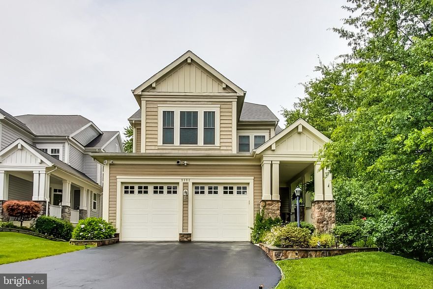 Welcome to this truly exceptional home nestled in the heart of Lorton, where comfort, elegance, and convenience harmoniously come together. With its remarkable features and desirable location, this property is a true gem that will captivate your heart from the moment you step inside.

This magnificent home boasts four spacious bedrooms and three and a half exquisite baths, offering an abundance of space for your family and guests. With three full levels, including a walk-out basement, you'll enjoy an expansive living area that caters to all your needs.

Situated on a premium corner lot, this residence offers the perfect blend of tranquility and privacy. Imagine waking up to the beauty of a mature wooded and fully fenced backyard every day. The brand new fence, installed in 2023, ensures both safety and aesthetic appeal. Additionally, the deck and private front porch provide idyllic spots to savor your morning coffee or relax amidst nature's serenity.

Prepare to be dazzled by the recent gourmet kitchen remodel in 2020. Adorned with stunning quartz counters and top-of-the-line stainless steel appliances, this culinary haven will inspire your inner chef. Whether you're hosting a dinner party or enjoying a quiet family meal, this kitchen is sure to be the heart of your home.

This residence caters to modern needs with a dedicated private office on the main level, perfect for those who desire a peaceful work-from-home space. Stay connected and entertained with the Nuveo Music system, allowing you to effortlessly control music both inside and outside the home. Picture yourself starting the day on the deck, basking in the morning sunlight and enjoying a symphony of melodies.

Step onto the gleaming hardwood floors that span the entire main level, enhancing the elegance and warmth of the home. Crown molding adds a touch of sophistication, elevating the aesthetic appeal to new heights. The lower-level family room is an entertainer's delight, providing ample space to create lasting memories with loved ones. With a full bath and a non-legal bedroom on this level, your guests will be treated to the utmost comfort.

Indulge in moments of relaxation and rejuvenation in the hot tub on the lower patio, where you can unwind after a long day. Storage will never be a concern, thanks to the ample space in the basement and the convenient shed.

This remarkable property is ideally located within the highly sought-after South County school pyramid. Commuting is a breeze with easy access to Rt. 1, Ft. Belvoir, I95, and the Virginia Rail Express. Nature enthusiasts will appreciate the proximity to Mason Neck State Park, Pohick Bay Park, and the scenic hiking trails. Lorton itself offers a plethora of amenities, including the INOVA Healthplex, Workhouse Arts Center, and a wide array of new dining and shopping options.

With its fenced yard and 2-car garage, this home effortlessly combines practicality and comfort for easy living. Don't miss the chance to make this your forever home, where every day feels like a dream come true. Schedule your showing today and let this captivating residence welcome you to the vibrant community of Lorton, VA!