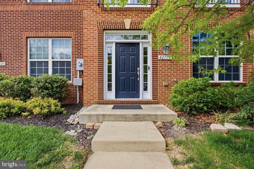 Welcome to Goose Creek Village, where style, space, and convenience come together in this beautifully updated 3 bedroom, 2 full bath, 2 half bath townhome. Thoughtfully designed for modern living, this home features refinished hardwood floors, custom built ins, and a bright open layout ideal for both everyday comfort and entertaining.
The entry level offers a spacious foyer leading to a large family room, perfect for a home office, gym, playroom, or additional living space, along with a convenient half bath. Upstairs, the main level is filled with natural light and offers seamless flow between the living room, dining area, and gourmet kitchen. A striking multi sided fireplace creates warmth and character while defining the space.
The kitchen is a standout with granite countertops, shaker style cabinetry, sleek appliances, and a center island perfect for meal prep and gathering. Just off the dining area, step onto the balcony. A second half bath completes the main level.
Upstairs, the spacious primary suite features abundant natural light, a walk in closet with custom built ins, and a private bath with double vanity. Two additional generously sized bedrooms share a well appointed hall bath, and the laundry is conveniently located on the bedroom level.
Additional highlights include a large 2 car garage, driveway parking, and extra storage space. Residents enjoy outstanding community amenities including an outdoor pool, parks, playgrounds, and walking trails.
Ideally located just steps from Goose Creek Village Center with Harris Teeter, Walgreens, shops, dining, and everyday conveniences. Minutes to Belmont Station Elementary, Trailside MS, and Stone Bridge HS, multiple golf courses, outdoor recreation, Route 7, the Dulles Greenway, and Dulles International Airport.